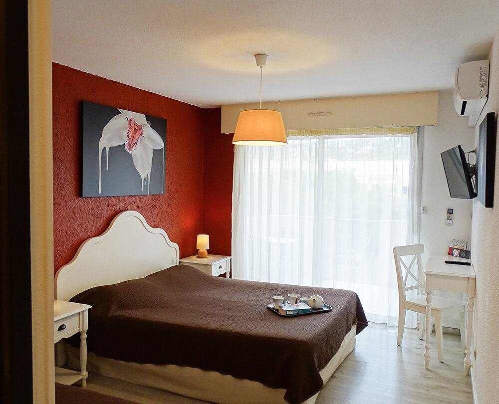 Chambre triple de l'hôtel Vénezia dans l’Hérault à Sète