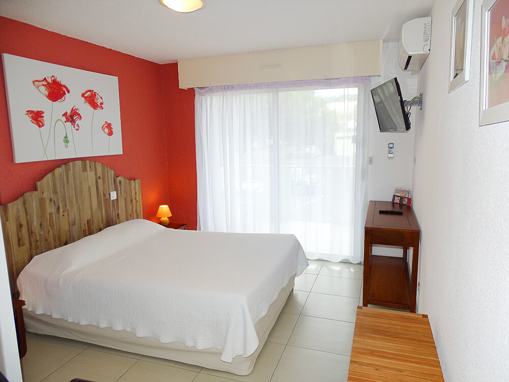 Chambre triple de l'hôtel Vénezia dans l’Hérault